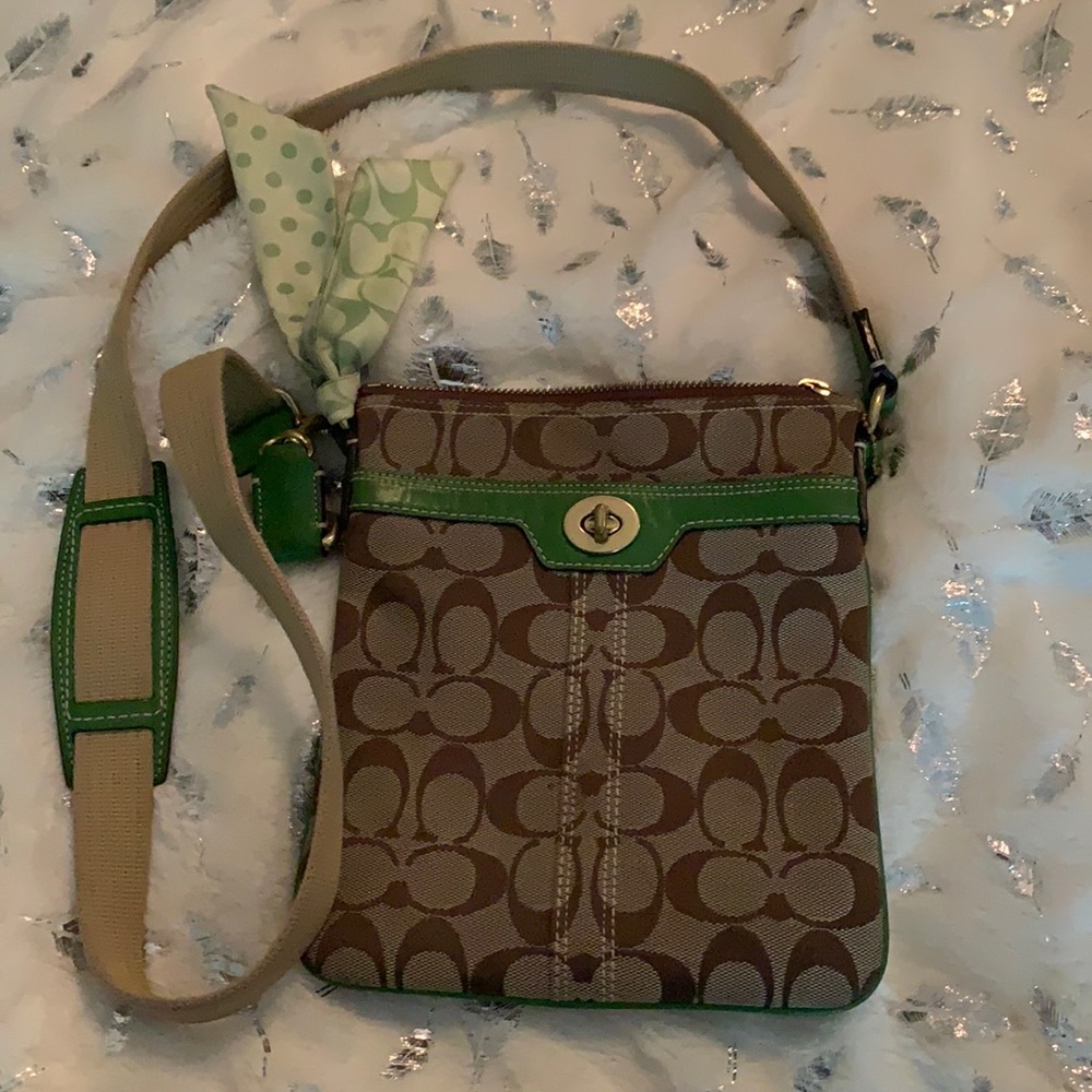 Used Coach crossbody with green detailing
